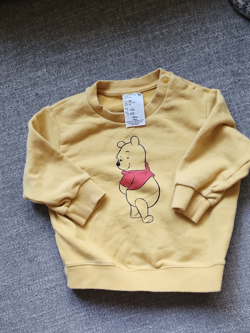 Uniqlo Kids Yellow Winnie the Pooh Sweatshirt with Red Accent